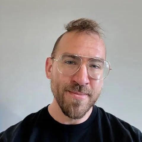 Photo of Marek Poliks, Head of AI at LaunchDarkly, co-author of "The Superdark Factory"